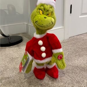 Dr. Seuss The Grinch Plush Toy in Santa Outfit Animated. Songs the theme song